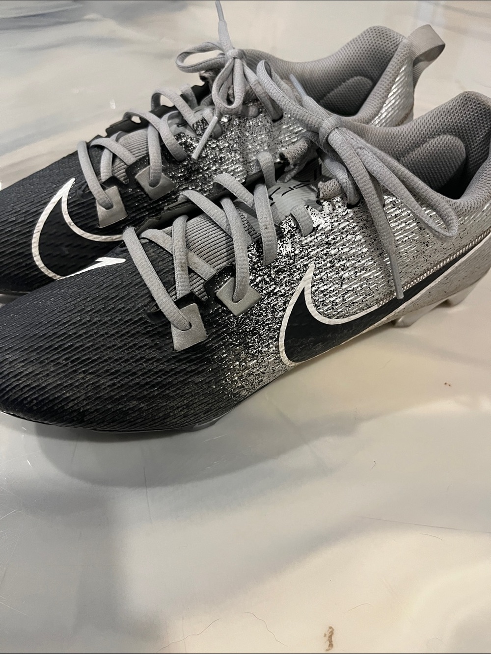 Nike Black and Gray Gradient Athletic Cleats